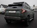 2024 Dacia Duster III, зелёный - вид 3