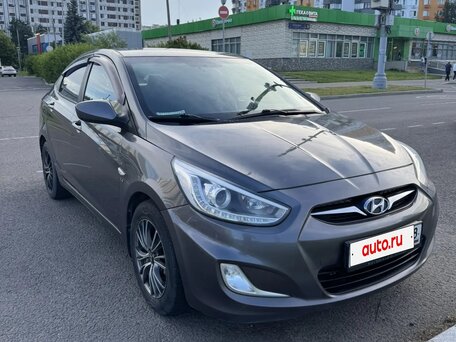 2013 Hyundai Solaris I, чёрный, 720000 рублей, вид 1