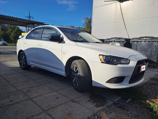 2011 Mitsubishi Lancer X Рестайлинг, белый, 850000 рублей, вид 3