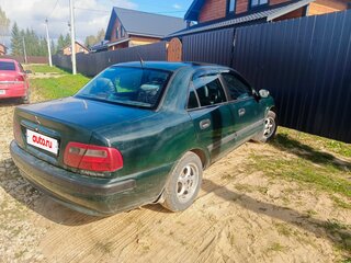 1999 Mitsubishi Carisma I Рестайлинг, зелёный, 258000 рублей, вид 4