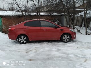 2013 Kia Rio III, красный, 555000 рублей, вид 1
