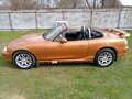 1998 Mazda MX-5 II (NB), золотистый, 960000 рублей - вид 5