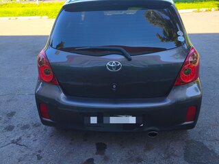 2010 Toyota Vitz II (XP90), серый, 720000 рублей, вид 3
