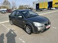 2010 Kia Rio II Рестайлинг, серебристый, 400000 рублей - вид 1
