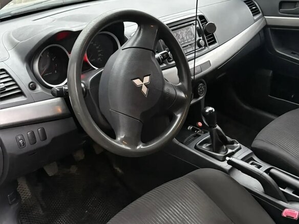 2013 Mitsubishi Lancer X Рестайлинг, серебристый, 799900 рублей - вид 7