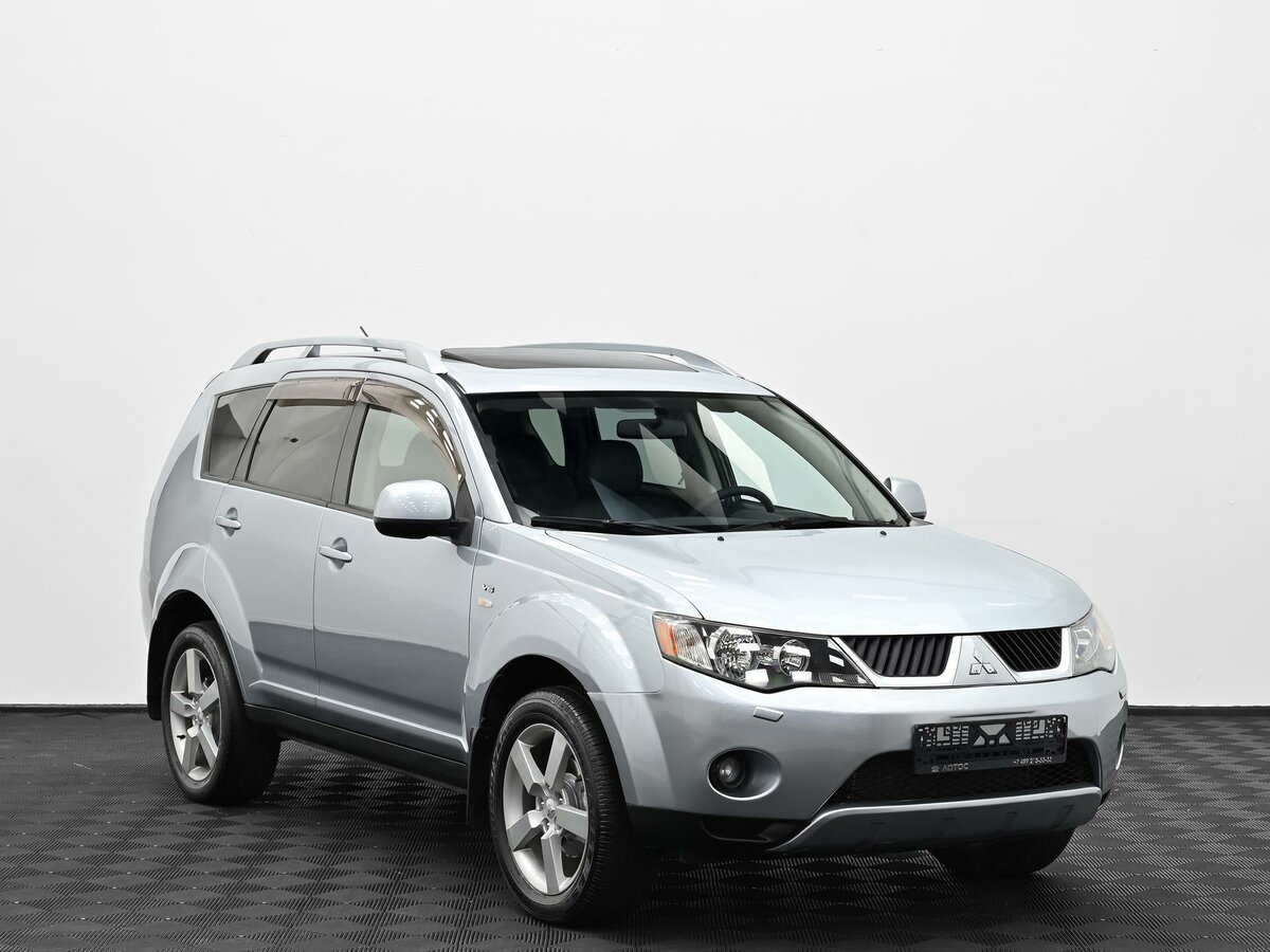 Открыть фотографии: Mitsubishi Outlander II