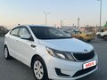 2013 Kia Rio 4-speed III, белый, 780000 рублей - вид 2