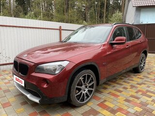 2010 BMW X1 18i I (E84), красный, 1099000 рублей, вид 2