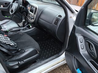 2006 Ford Maverick III, серебристый, 560000 рублей, вид 4