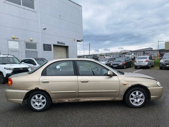 2009 Kia Spectra I Рестайлинг 2, серебристый - вид 7