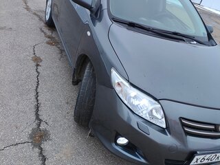 2009 Toyota Corolla X (E140, E150), серый, 790000 рублей, вид 2