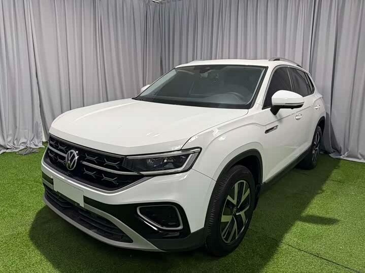 Открыть фотографии: Volkswagen Tayron I Рестайлинг