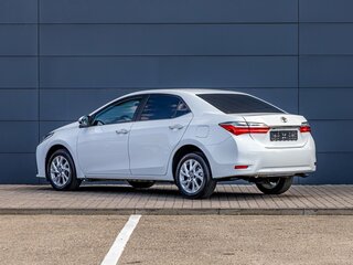 2016 Toyota Corolla XI (E160, E170, E180) Рестайлинг 1, белый, 1655000 рублей, вид 4