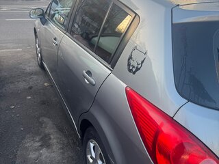 2010 Nissan Tiida I, серый, 550000 рублей, вид 2