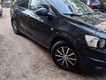 2012 Chevrolet Aveo II, чёрный, 460000 рублей - вид 3