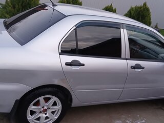 2008 Mitsubishi Lancer IX Рестайлинг, серебристый, 450000 рублей, вид 5