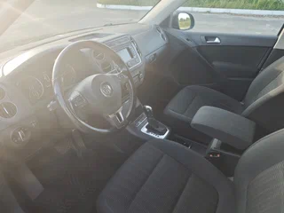 2013 Volkswagen Tiguan I Рестайлинг, чёрный, 1000000 рублей, вид 4