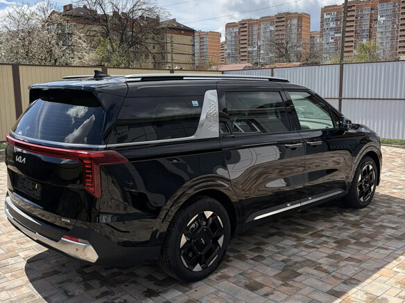 2025 Kia Carnival IV Рестайлинг, чёрный - вид 1