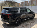 2025 Kia Carnival IV Рестайлинг, чёрный - вид 1