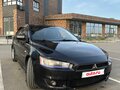 2010 Mitsubishi Lancer X, чёрный, 720000 рублей - вид 6