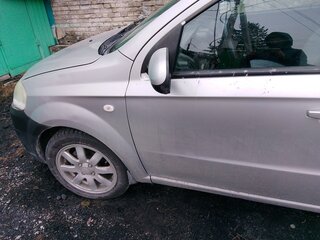 2010 Chevrolet Aveo I Рестайлинг, серебристый, 340000 рублей, вид 2