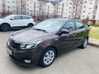 2015 Kia Rio III Рестайлинг, коричневый, 950000 рублей, вид 1