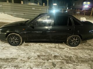 2012 Daewoo Nexia I Рестайлинг, чёрный, 220000 рублей, вид 1