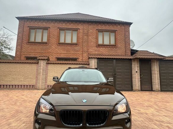 2011 BMW X1 18i I (E84), коричневый, 1450000 рублей