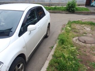 2009 Nissan Tiida Latio I, белый, 600000 рублей, вид 4