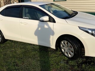 2014 Toyota Corolla XI (E160, E170, E180), белый, 1450000 рублей, вид 3