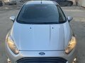 2015 Ford Fiesta Mk6 Рестайлинг, серебристый, 850000 рублей - вид 1