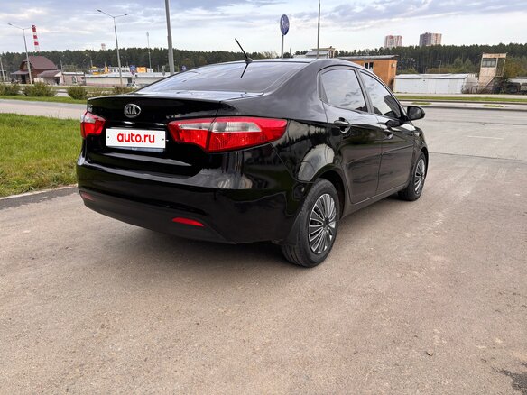 2014 Kia Rio 6-speed III, чёрный, 820000 рублей - вид 5