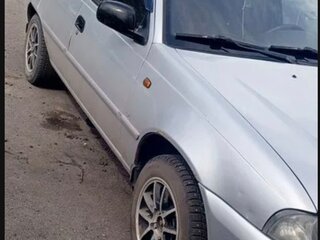 2012 Daewoo Nexia I Рестайлинг, серебристый, 160000 рублей, вид 1