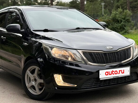2013 Kia Rio 4-speed III, чёрный, 620000 рублей - вид 3