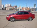2005 Toyota Corolla IX (E120, E130) Рестайлинг, красный, 370000 рублей - вид 3