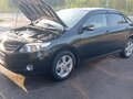 2012 Toyota Corolla X (E140, E150) Рестайлинг, чёрный, 1200000 рублей - вид 5