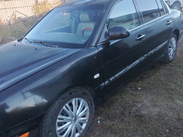 2005 Kia Opirus I, чёрный - вид 3