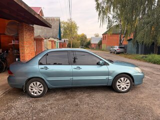 2006 Mitsubishi Lancer IX Рестайлинг, голубой, 400000 рублей, вид 2