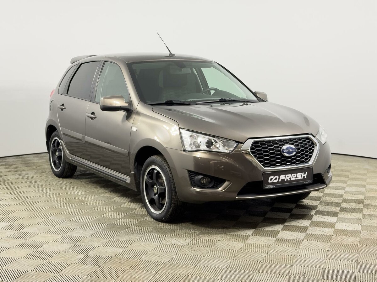 Открыть фотографии: Datsun mi-DO