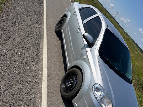 2010 Chevrolet Aveo I Рестайлинг, серебристый, 300000 рублей, вид 5