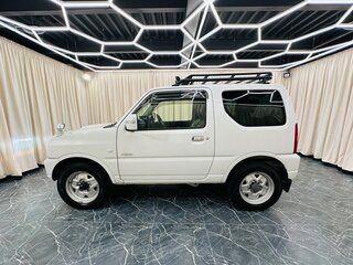 2012 Suzuki Jimny Kei car III Рестайлинг 2, белый, 1079000 рублей, вид 3