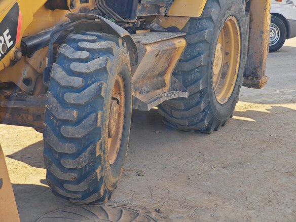 2011 Caterpillar 428, жёлтый, 4200000 рублей - вид 10