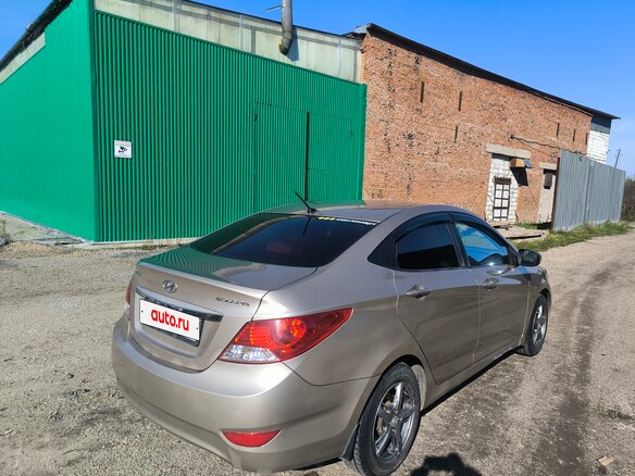 2011 Hyundai Solaris I, бежевый - вид 10
