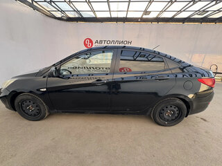2012 Hyundai Solaris I, чёрный, 573550 рублей, вид 2