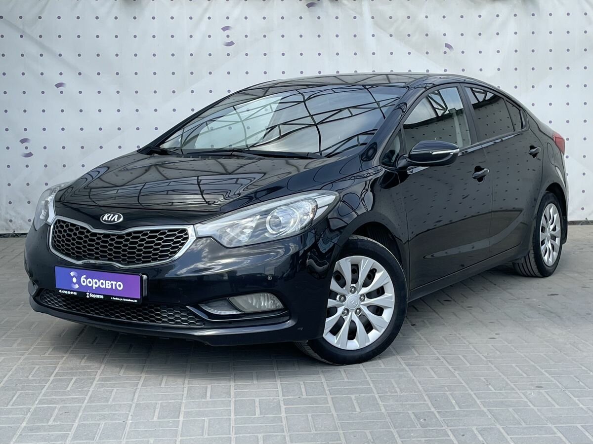 Открыть фотографии: Kia Cerato III