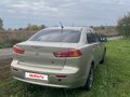 2008 Mitsubishi Lancer X, бежевый, 420000 рублей - вид 2