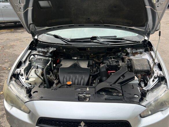 2008 Mitsubishi Lancer X, серебристый - вид 3