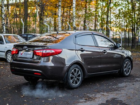 2014 Kia Rio 6-speed III, коричневый, 480000 рублей, вид 2