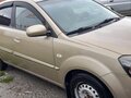 2010 Kia Rio II Рестайлинг, бежевый, 550000 рублей - вид 2