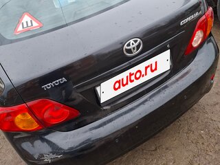 2007 Toyota Corolla X (E140, E150), чёрный, 650000 рублей, вид 2